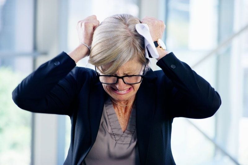 Image of someone pulling their hair in frustration. Video - Have your utility bills jumped?